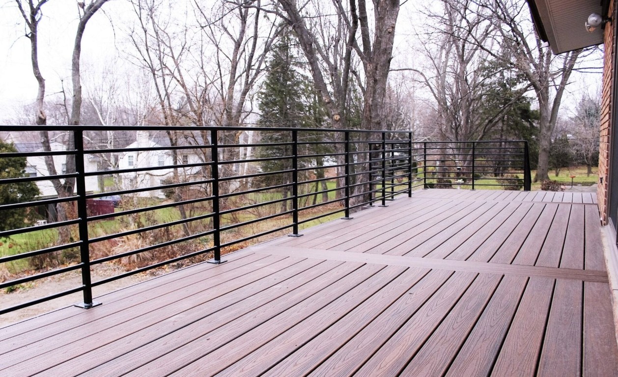 Modern deck design with multiple functional zones and cable railing system